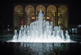 Large fountain night spraying water - water free wallpaper for desktop