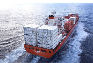 Cargo ship containers ocean water - symmetric free wallpaper