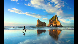 Beach walking person rock formation - bob thompson free wallpaper