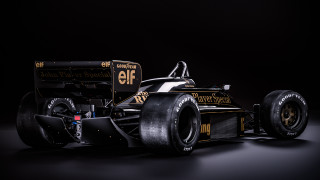 Black yellow racecar frontwheel detailed - the side of its free wallpaper