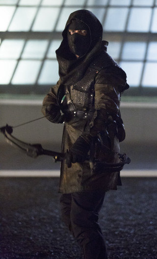 Man black outfit bow arrow 6 - a street free wallpaper for mobile