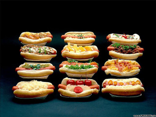 Hot dogs with toppings on 2 - a table top next free wallpaper