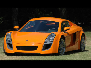 Bright orange sports car parked - orange sports car free wallpaper