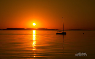 Boat sunset water peaceful scenery - the distance behind free wallpaper for desktop