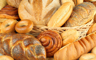 Basket filled breads rolls table - heavy grain free wallpaper