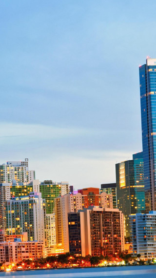 City skyline boat water foreground - a boat free wallpaper for mobile