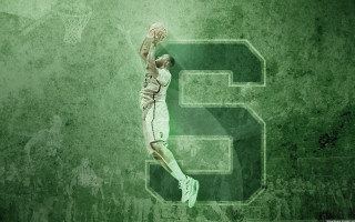 Basketball player dunking air number9 - a basketball in the air free wallpaper