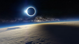 Solar eclipse space clouds stars 2 - a solar eclipse free wallpaper