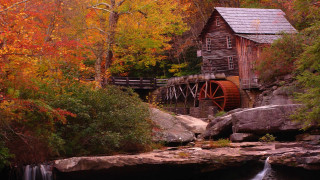 Wooden water mill fall waterfall - a waterfall free wallpaper
