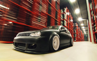 Car driving warehouse boxes red - a warehouse free wallpaper
