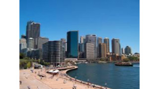 City skyline river boat people - free beach wallpaper for desktop