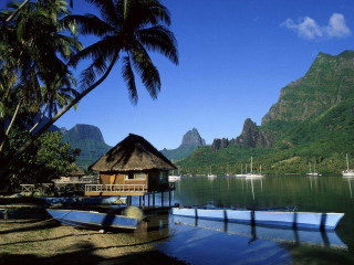 Boat docked tropical resort mountains - tropical free wallpaper for desktop