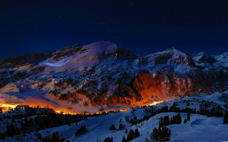 Snowy mountain lit area night - a full moon free wallpaper for desktop