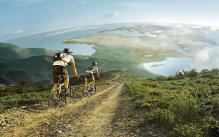 Couple biking dirt road lake - a lake and mountains free wallpaper