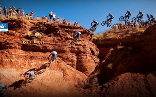 Biking group rocky cliff reef - a group of people riding free wallpaper