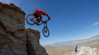 Man bike jumping cliff mountain - dave allsop free wallpaper