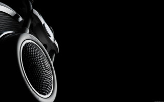 Headphones closeup black background white - studio quality free wallpaper