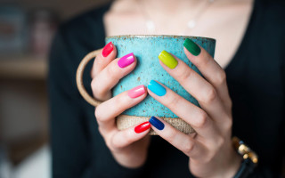 Woman holding cup colorful nails - a cup free wallpaper