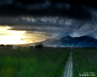 Train track field mountain sunset - a train track free wallpaper