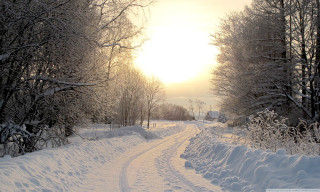 Snowy road forest sunset distant - a snowy road free wallpaper
