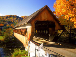 Covered bridge fence autumn leaves - a few yellow leaf free wallpaper