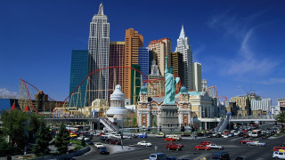 City tall buildings cars driving - a bridge in the middle free wallpaper