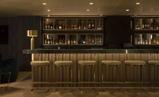 Bar stools bottles television art - a bar free wallpaper