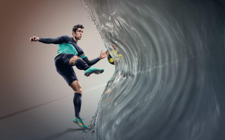 Man surfing wave ocean balls - his hand and a ball free wallpaper