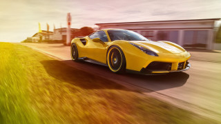 Yellow sports car road building - a road next free wallpaper