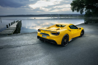 Yellow sports car water dock - the side of a road near a body of water free wallpaper
