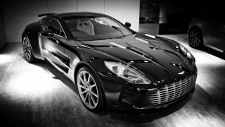 Black white sports car showroom - a ghost free wallpaper