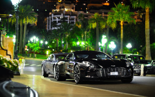 Black sports car night building - chrome free wallpaper