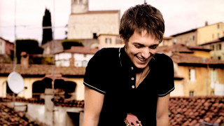 Man holding cell phone smiling - david boyd free wallpaper