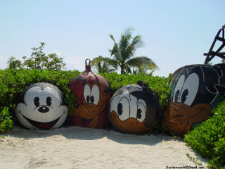 Cartoon characters painted rocks beach - a surrealist sculpture free wallpaper