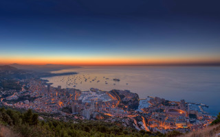 City lit night ocean mountains - panoramic view free wallpaper for desktop