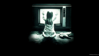 Woman sitting floor tv hands - a tv free wallpaper