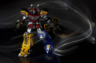 Robot standing dark light blurry - a blurry background behind free wallpaper for desktop