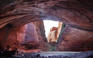 Person cave mountains sky view - albert namatjira free wallpaper