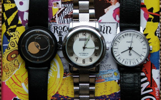 Three watches colorful background posters - product photo free wallpaper for desktop