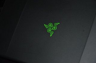 Laptop green sticker dark cover - a laptop free wallpaper