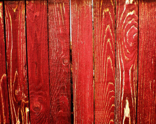 Red wooden fence closeup background - a woodcut free wallpaper