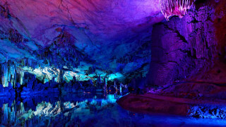 Cave pool water rock formation - a large rock formation free wallpaper