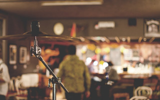 Drum set person background person - shallow depth of field free wallpaper