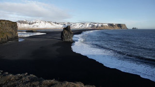 Black beach rock formation snowy - artur grottger free wallpaper