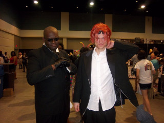 Two men black white posing - a large room free wallpaper