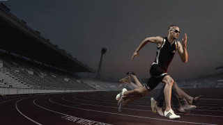 Man running track stadium crowd - christian w. staudinger free wallpaper