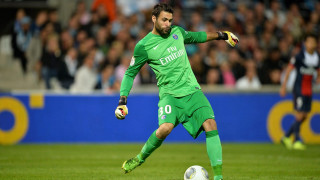 Soccer player green uniform kicking - a soccer player free wallpaper