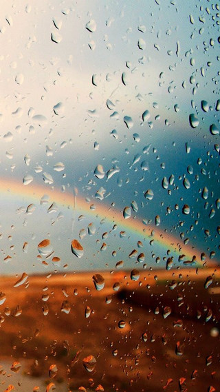 Rainbow rain covered window background - free rain wallpaper for mobile