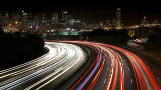 City skyline traffic night long - the car free wallpaper