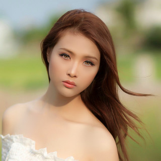 Woman longhair whiteDress greenField photorealistic - long hair free wallpaper for tablet